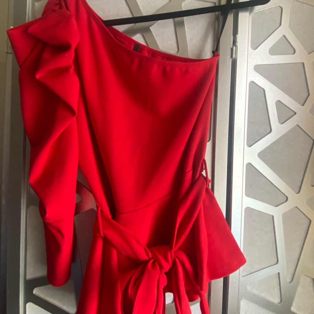 Red one shoulder top. New without tag.